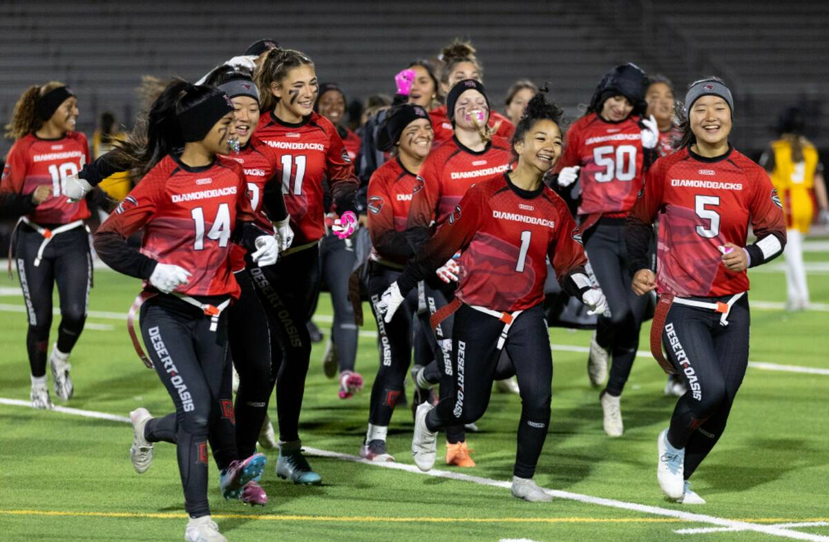 Desert Oasis celebrates their win against Bonanza in a high school flag football game at Desert ...