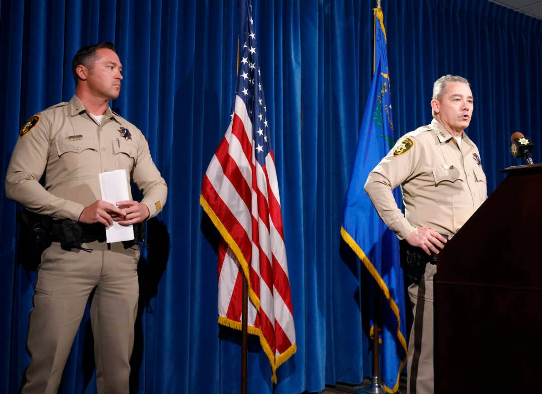 Undersheriff Andrew Walsh, right, speaks about two Nevada State Troopers that were skilled on I ...