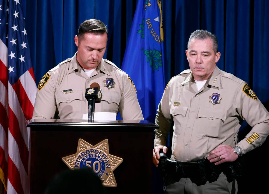 Undersheriff Andrew Walsh, right, speaks about two Nevada State Troopers that were killed on I- ...