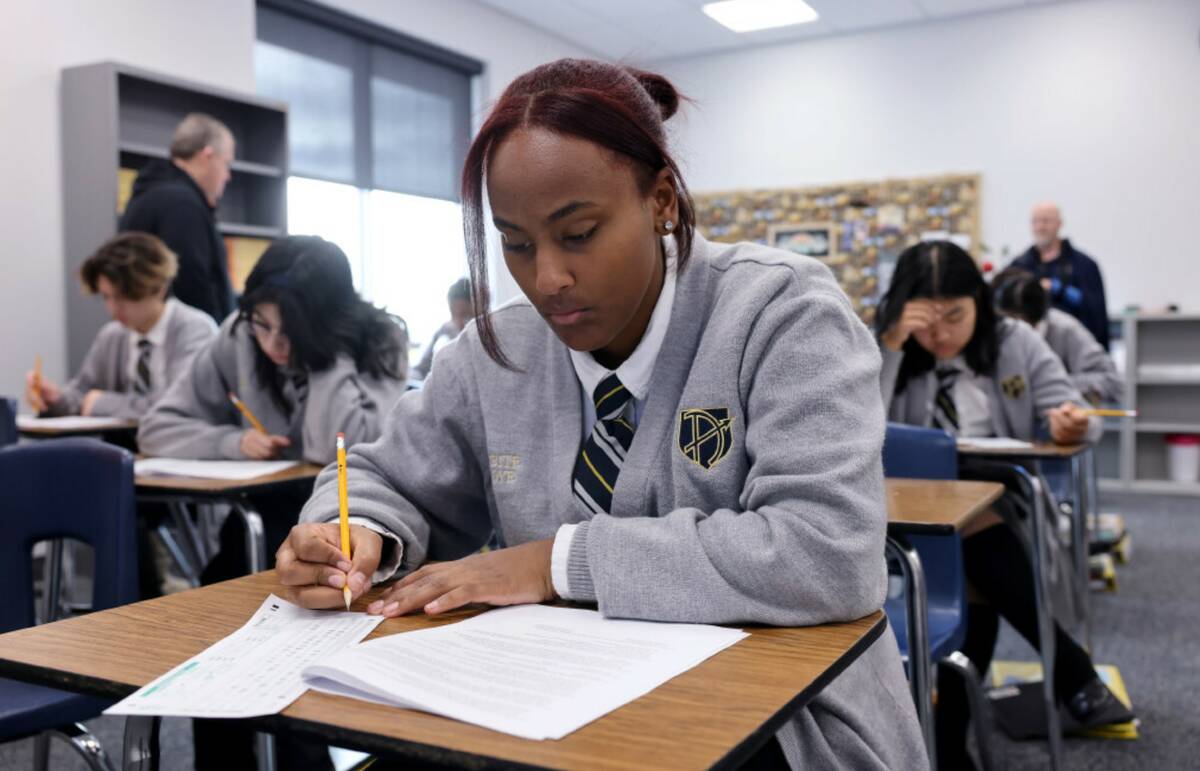 Senior Tinbite Aboye takes a test in EMT class at Amplus Academy in Las Vegas Wednesday, Nov. 2 ...