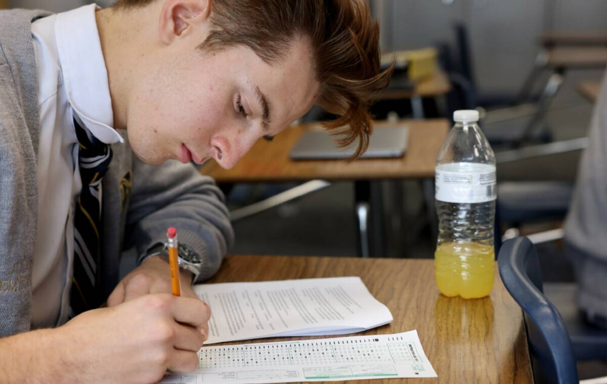 Senior Jude Clemensen takes a test in EMT class at Amplus Academy in Las Vegas Wednesday, Nov. ...