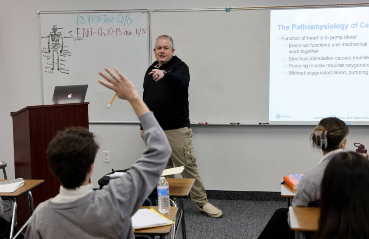 Mark Calabrese teaches EMT class at Amplus Academy in Las Vegas Wednesday, Nov. 29, 2023. (K.M. ...