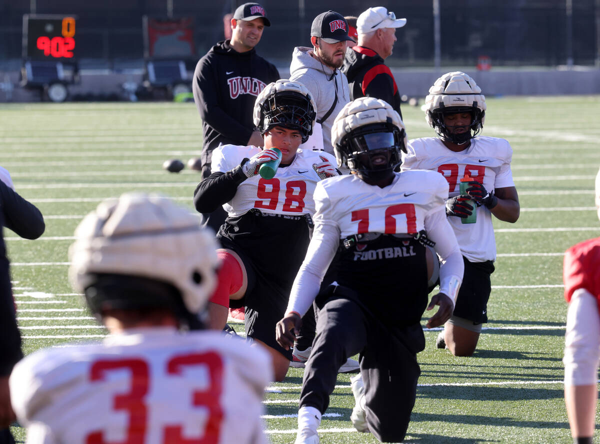 UNLV football walk-on defensive lineman Tatuo Martinson (98) works out during practice at Rebel ...