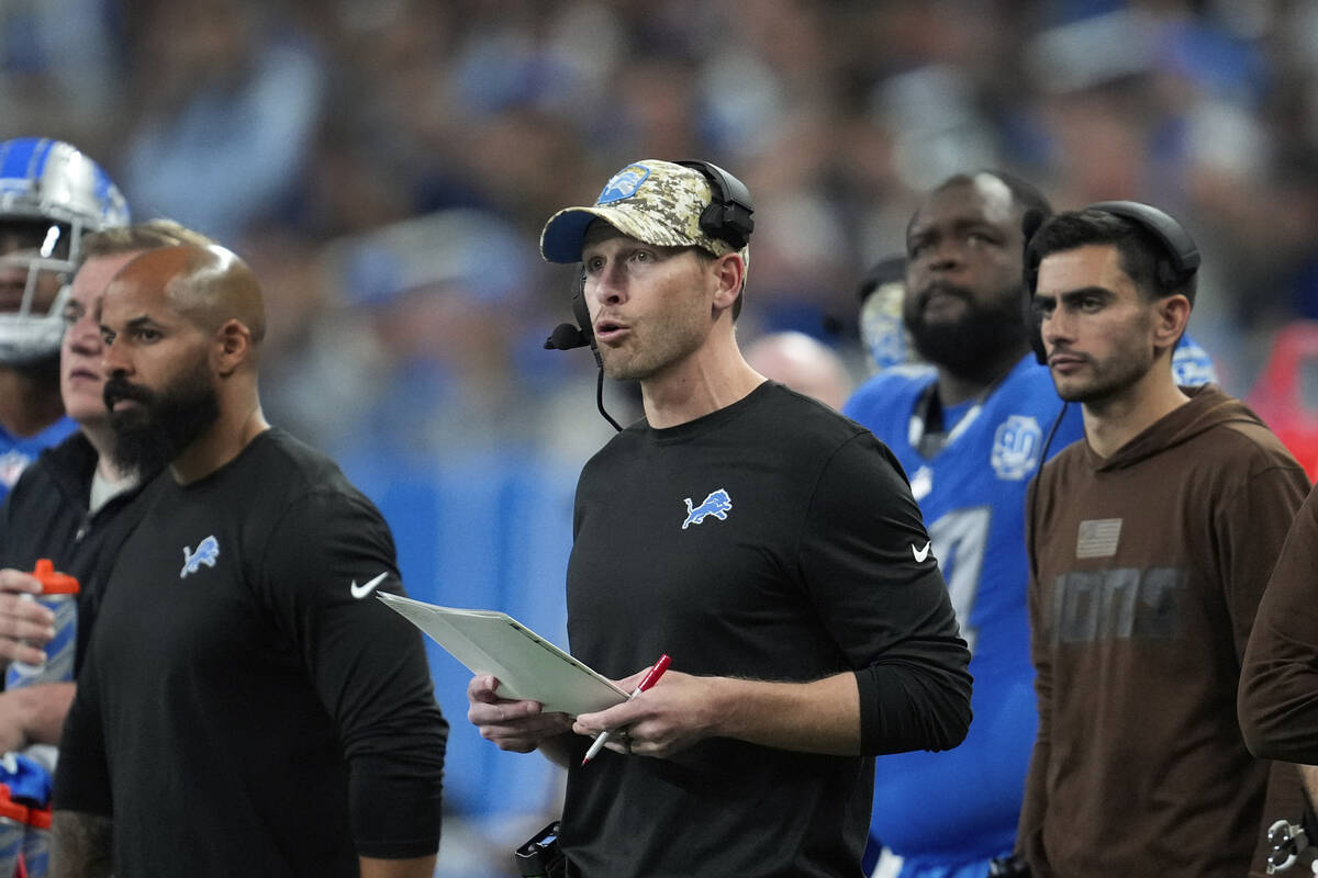 Detroit Lions offensive coordinator Ben Johnson watches during an NFL football game against the ...