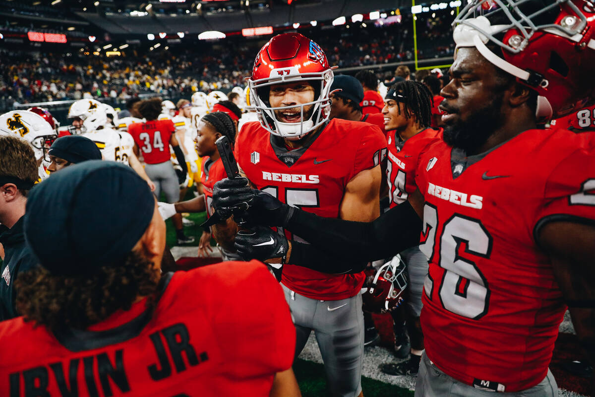 UNLV wide receiver Landon Rogers (15) celebrates a win over Wyoming at Allegiant Stadium on Fri ...