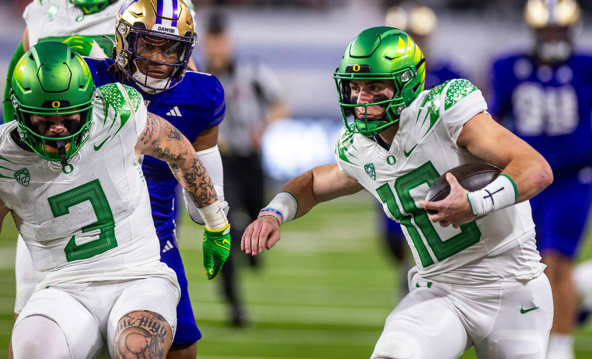 Oregon Ducks quarterback Bo Nix (10) looks for the end zone just short of a touchdown run again ...