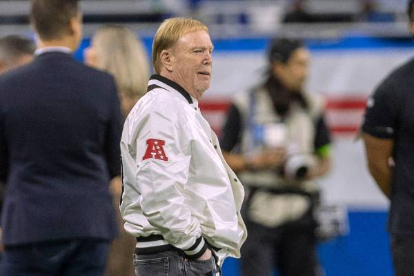 Raiders owner Mark Davis watches team warmups from the sideline before an NFL game between the ...