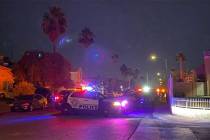 Las Vegas police at the scene of an officer-involved shooting near East Sahara Avenue and Sloan ...