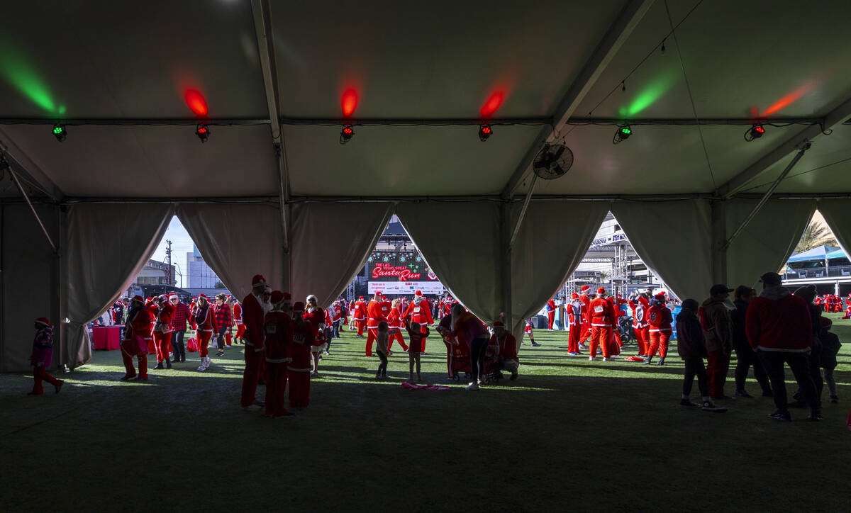 Participants take in pre-race activities at the Downtown Las Vegas Events Center during the Las ...