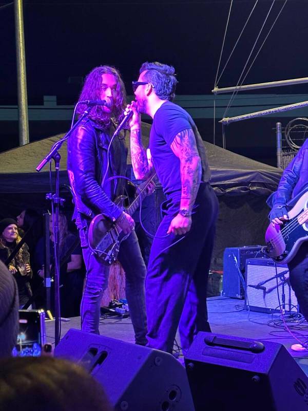 Frankie Sidoris, left, and vocalist Franky Perez jam with Slash at the reopening of Hard Hat Lo ...