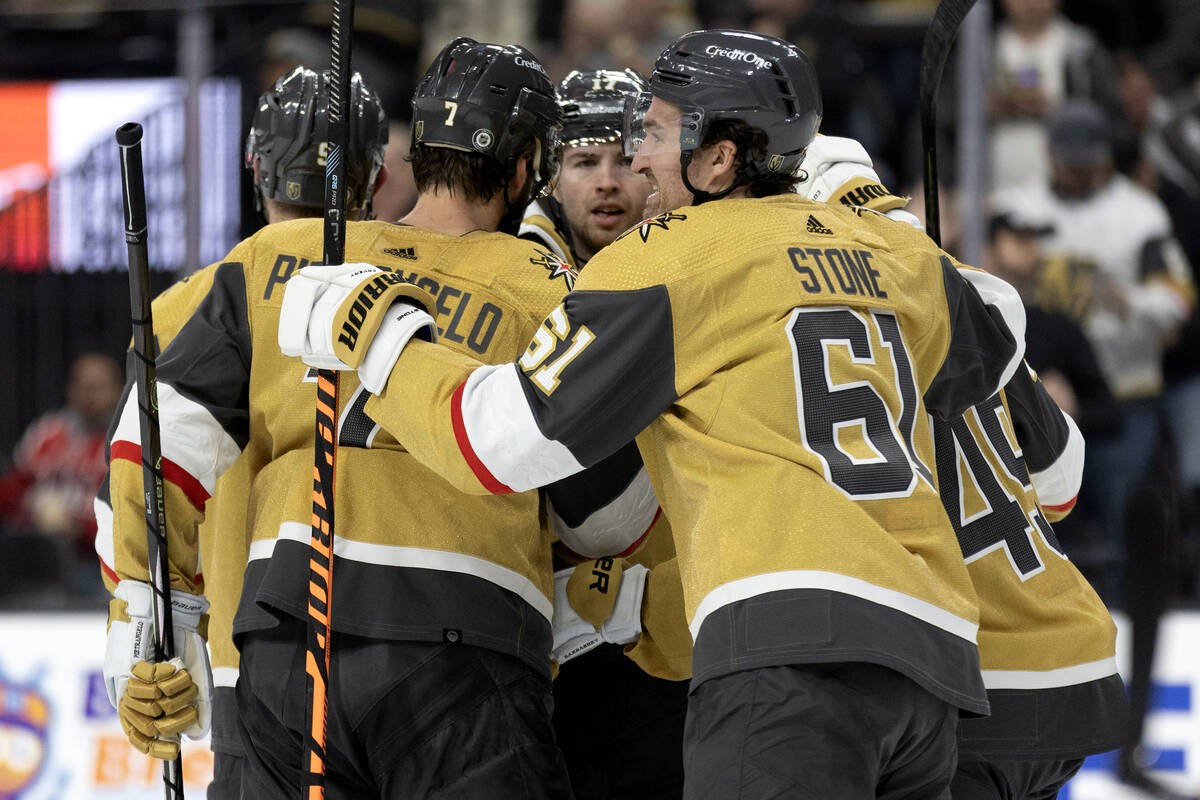 Golden Knights right wing Mark Stone (61) celebrates his goal with teammates during the third p ...