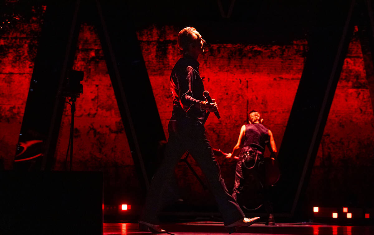 Dave Gahan, left, and Martin Gore of Depeche Mode perform at T-Mobile Arena on Friday, Dec. 1, ...