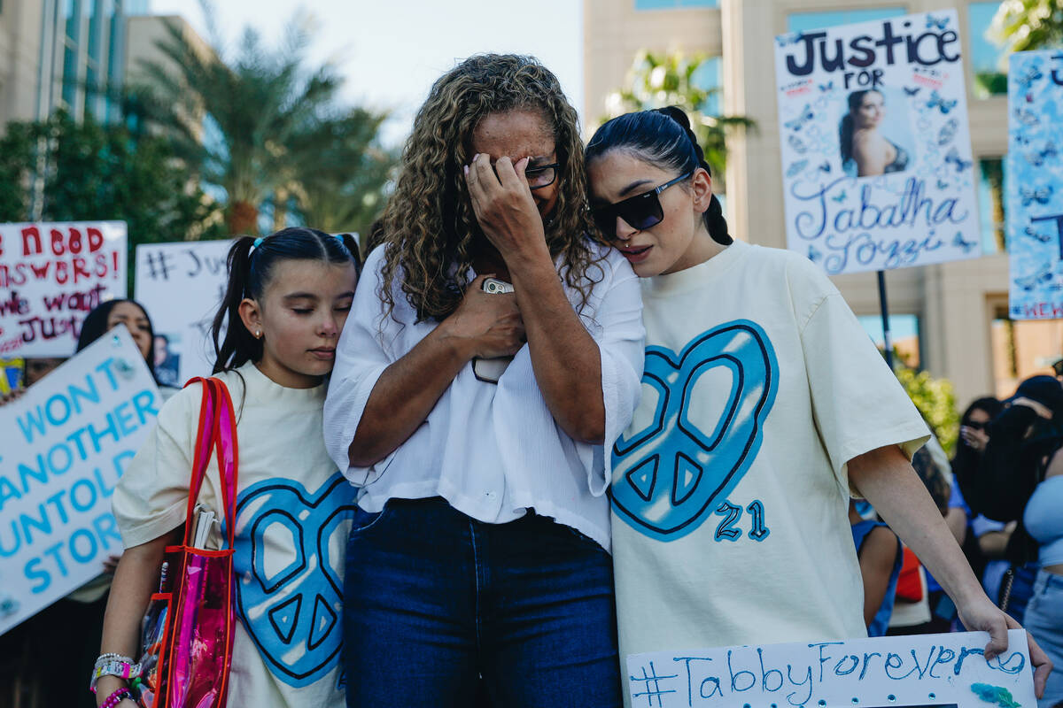 From left: Macy Diaz, 8, Regina Lacerda, the mother of Tabatha Tozzi, and Alicia Lozoya get emo ...