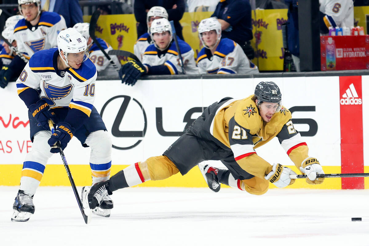 St. Louis Blues center Brayden Schenn (10) watches as Vegas Golden Knights center Brett Howden ...