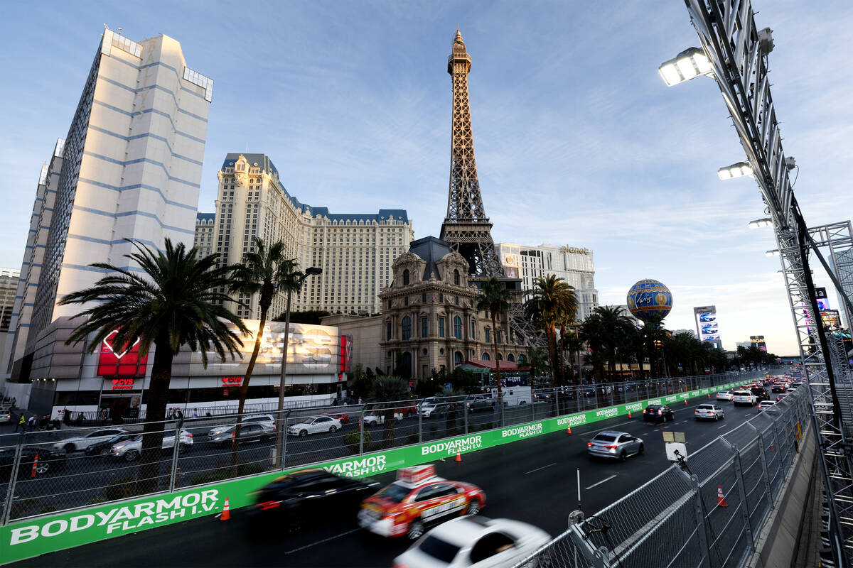 Traffic moves on Las Vegas Boulevard as seen from the grandstands at the Bellagio Fountain Club ...