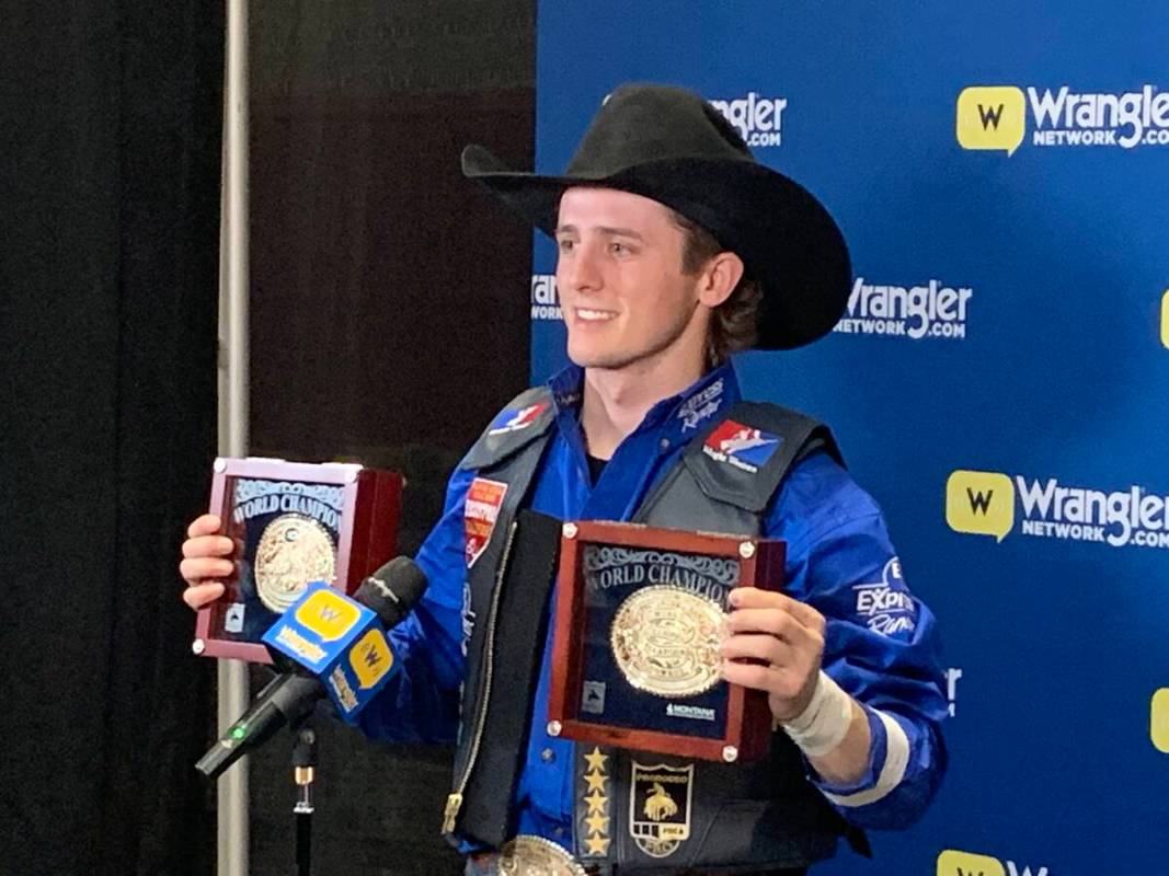 Stetson Wright displays his two world championship gold buckles after the final round of the 20 ...