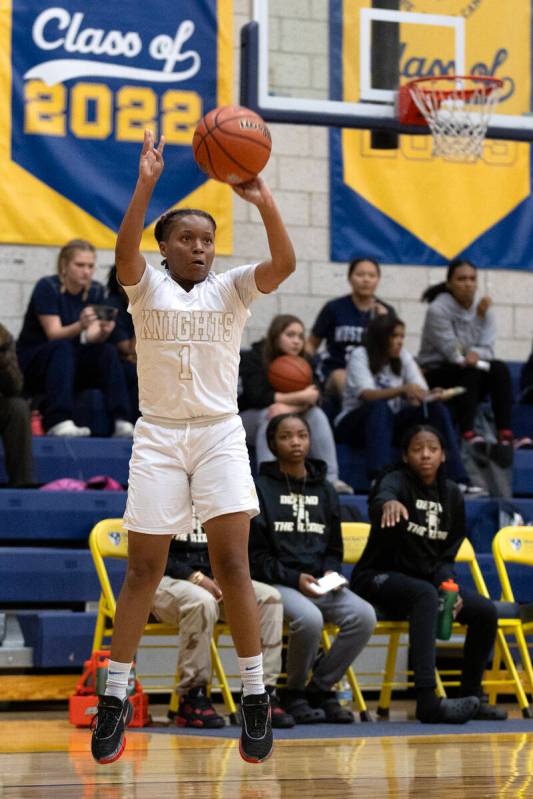 Democracy Prep’s Mikiah Verdum (1) shoots against Shadow Ridge during a girls high schoo ...