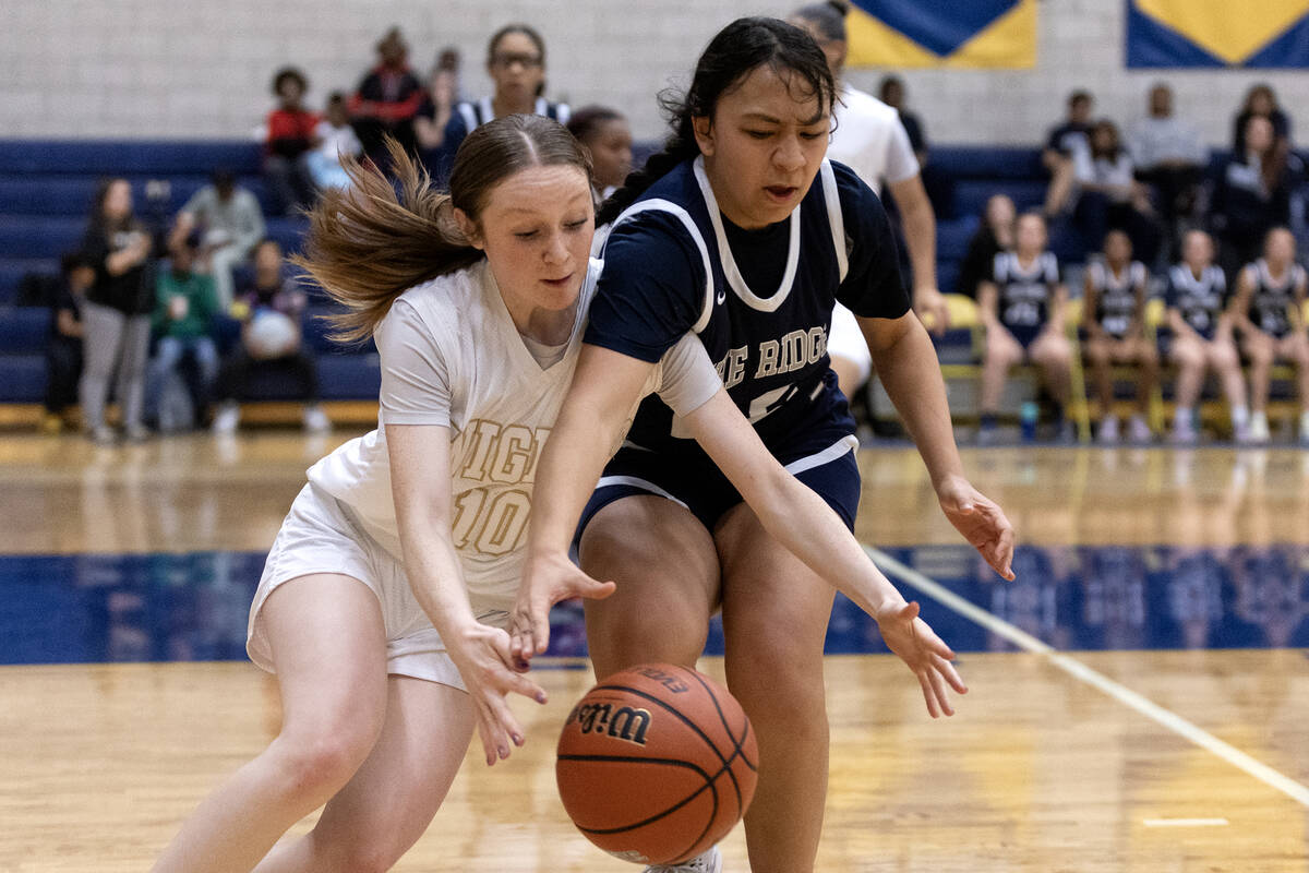 Democracy Prep’s Madison Smith (10) dives for the ball against Shadow Ridge’s Jas ...