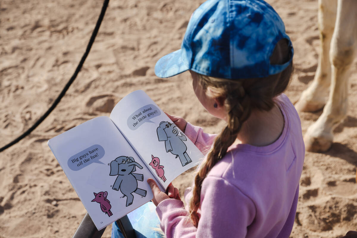 Eliora Oles, 9, reads to Lagertha at Talisman Farm in Las Vegas, Sunday, Dec. 10, 2023. Hillner ...