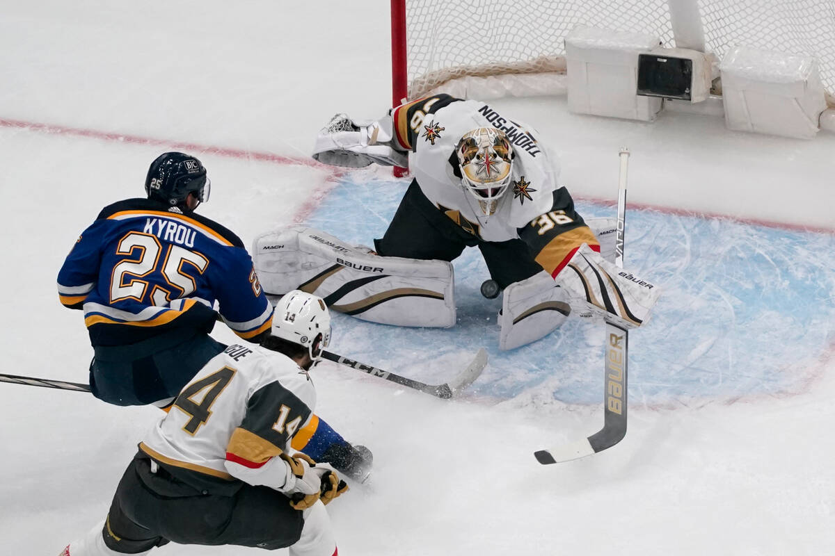 St. Louis Blues' Jordan Kyrou (25) scores past Vegas Golden Knights goaltender Logan Thompson a ...