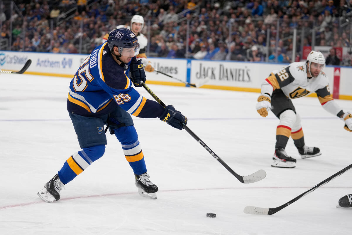 St. Louis Blues' Jordan Kyrou (25) shoots during the second period of an NHL hockey game agains ...