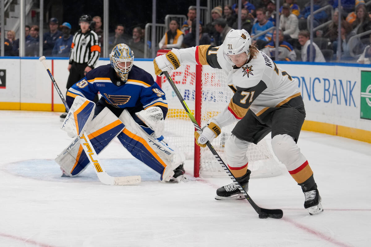 Vegas Golden Knights' William Karlsson (71) handles the puck as St. Louis Blues goaltender Jord ...