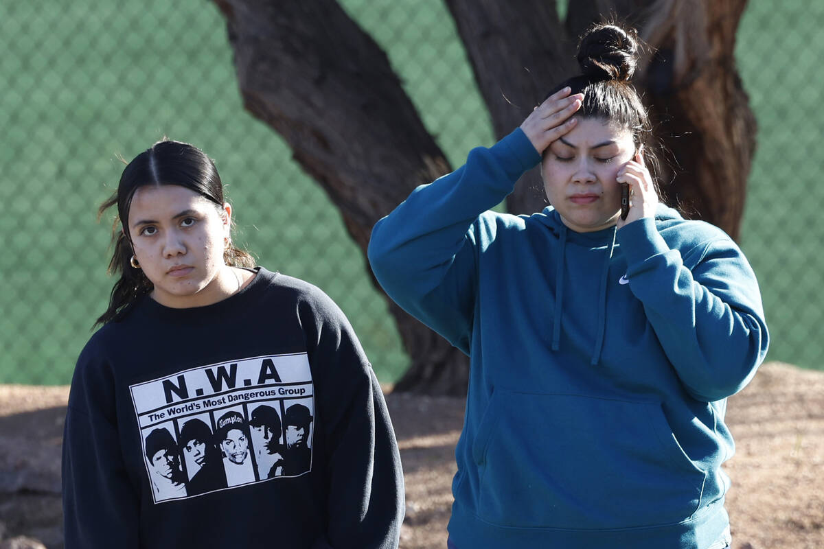 Parents gather outside of UNLV where police confirmed multiple shooting victim at the campus on ...