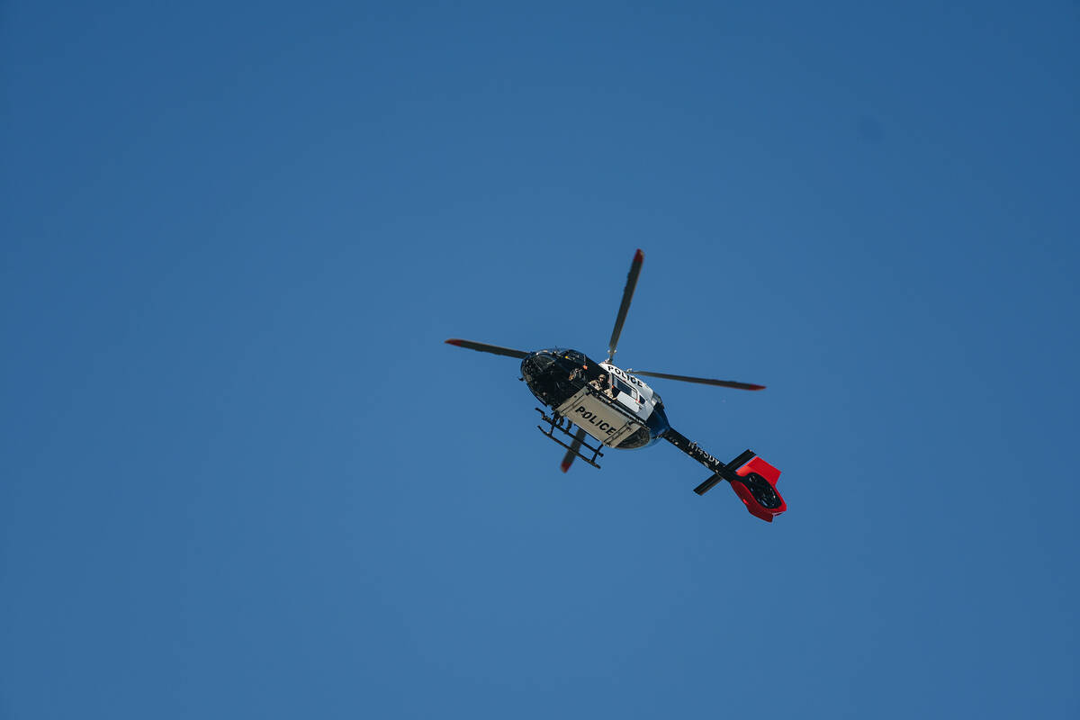 Police are seen at the scene of a shooting on the UNLV campus on Wednesday, Dec. 6, 2023, in La ...