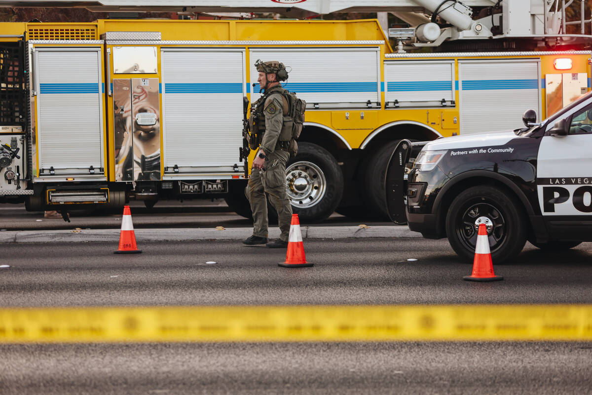 Police are seen at the scene of a shooting on the UNLV campus on Wednesday, Dec. 6, 2023, in La ...