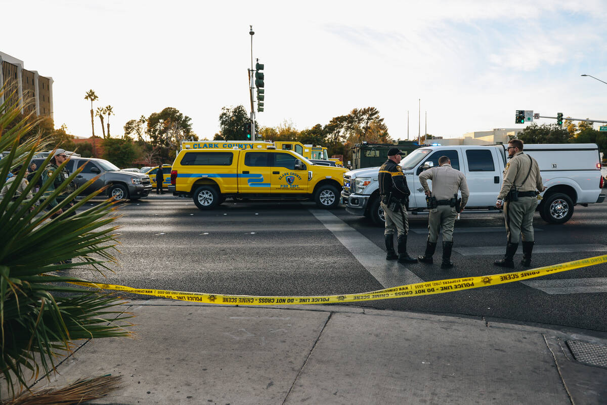 Police are seen at the scene of a shooting on the UNLV campus on Wednesday, Dec. 6, 2023, in La ...