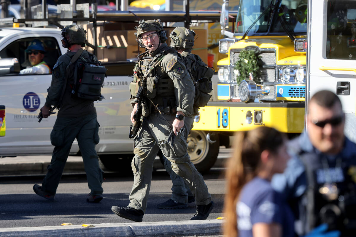 Police patrol on Maryland Parkway after a shooting on the UNLV campus in Las Vegas on Wednesday ...