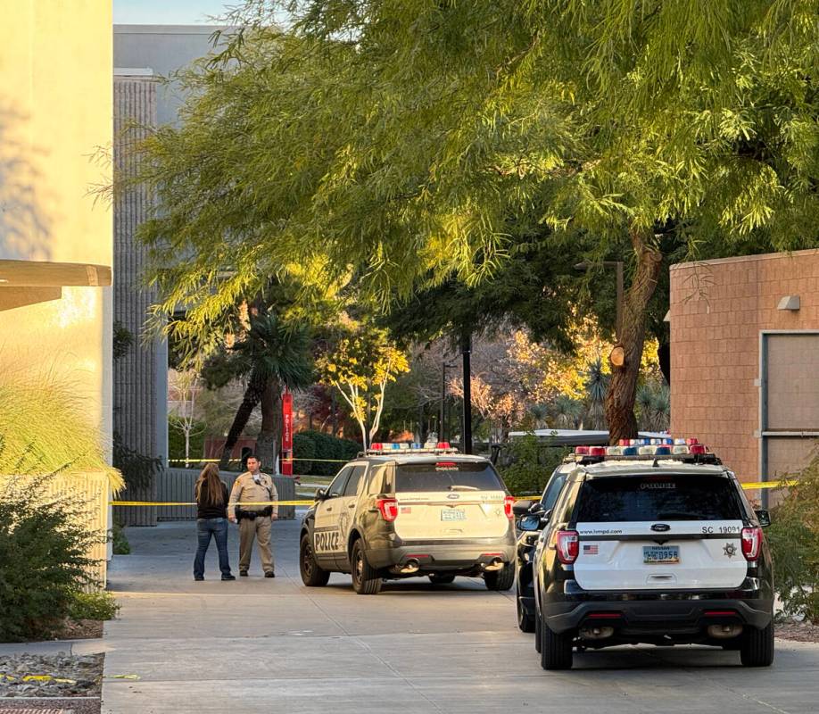 Police investigate between the Student Union and Beam Hall on the UNLV campus in Las Vegas Thur ...