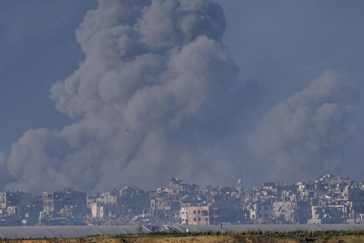 Smoke rises following an Israeli bombardment in the Gaza Strip, as seen from southern Israel, W ...