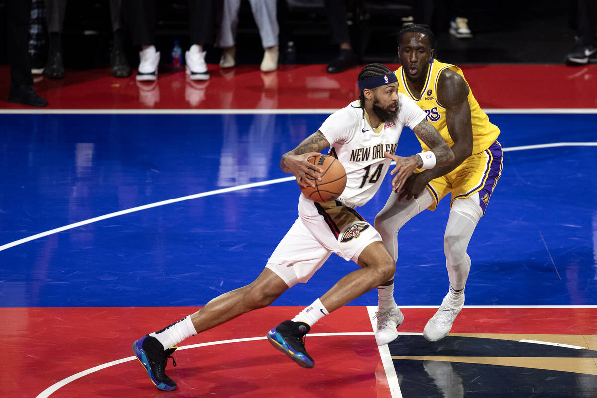 New Orleans Pelicans forward Brandon Ingram (14) drives toward the hoop against Los Angeles Lak ...