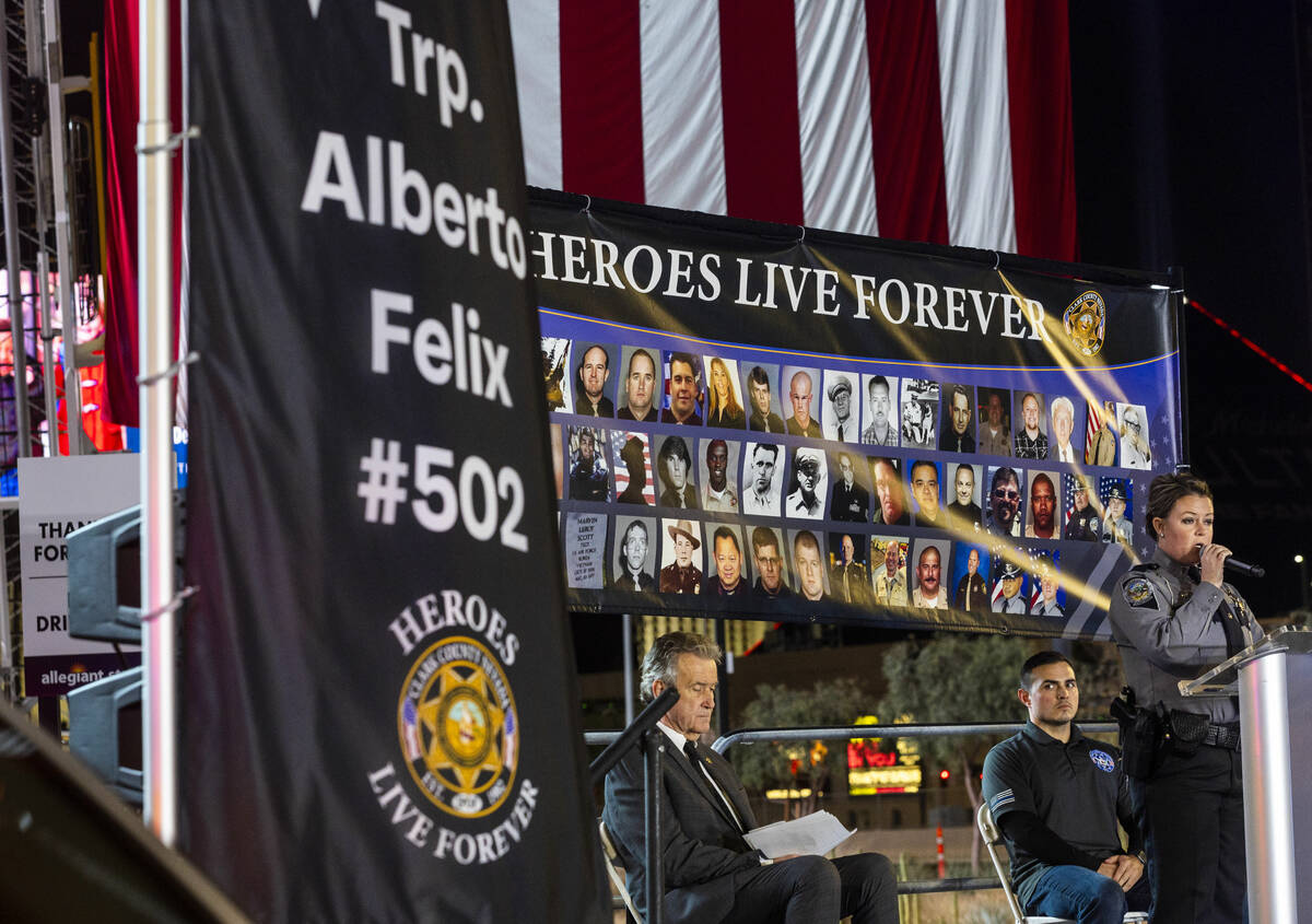 Lt. Chelsea Stuenkel speaks about her officers during a candlelight vigil for Nevada Highway Pa ...