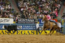 Tie-Down roper Cody Ohl scores a time of 7.10 seconds for a tie for first place with Hunter Her ...