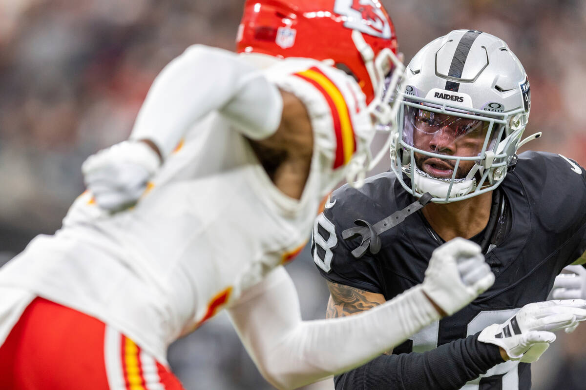 Las Vegas Raiders cornerback Jack Jones (18) in coverage against the Kansas City Chiefs in an N ...