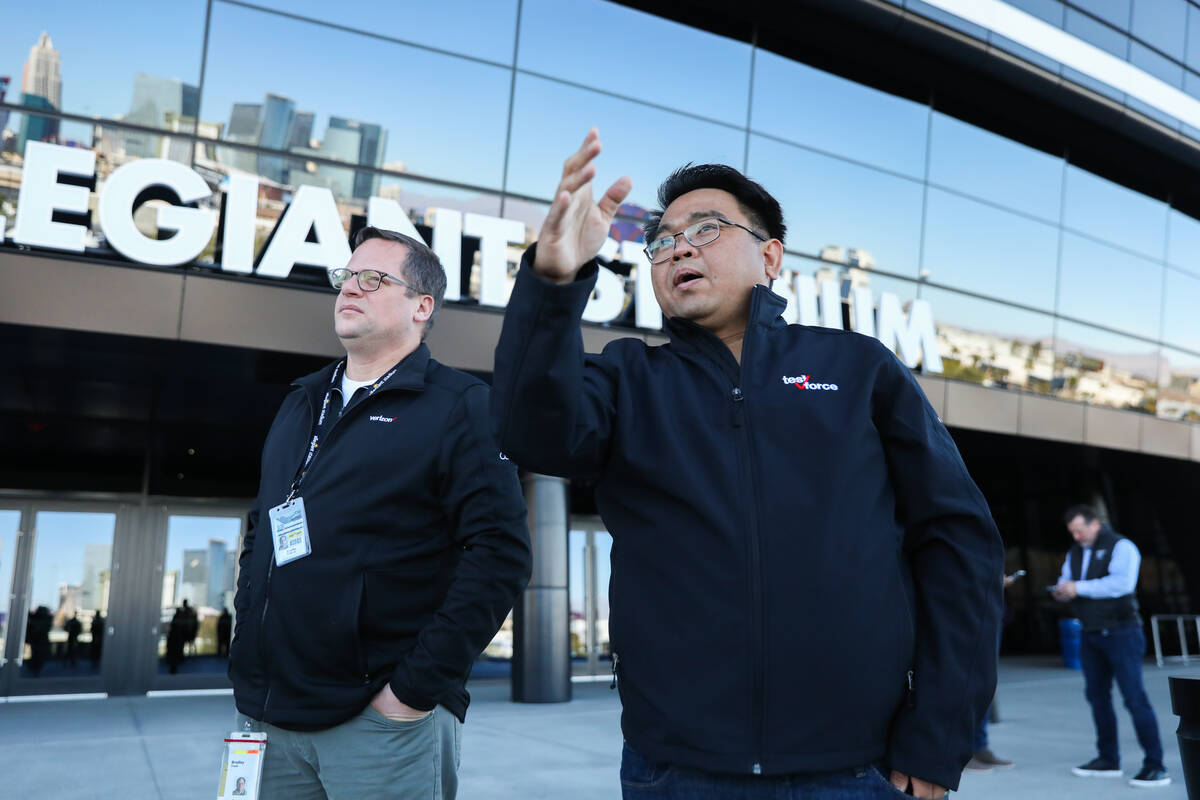 Bradley Frank, left, senior performance engineer at Verizon, and Vivencio Luna, senior manager ...