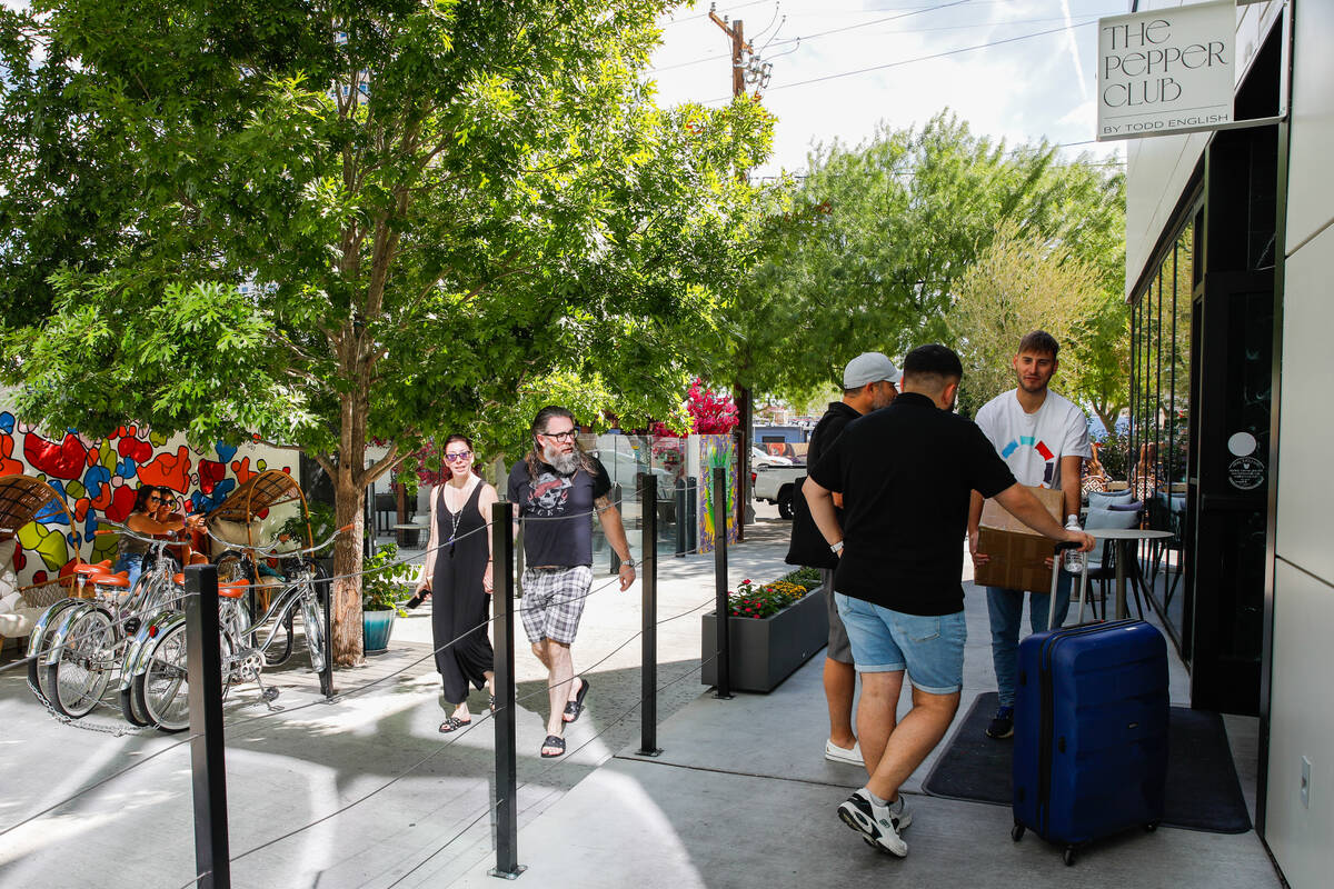 Customers arrive to The Pepper Club, which is part of the Midtown development, on Friday, Oct. ...