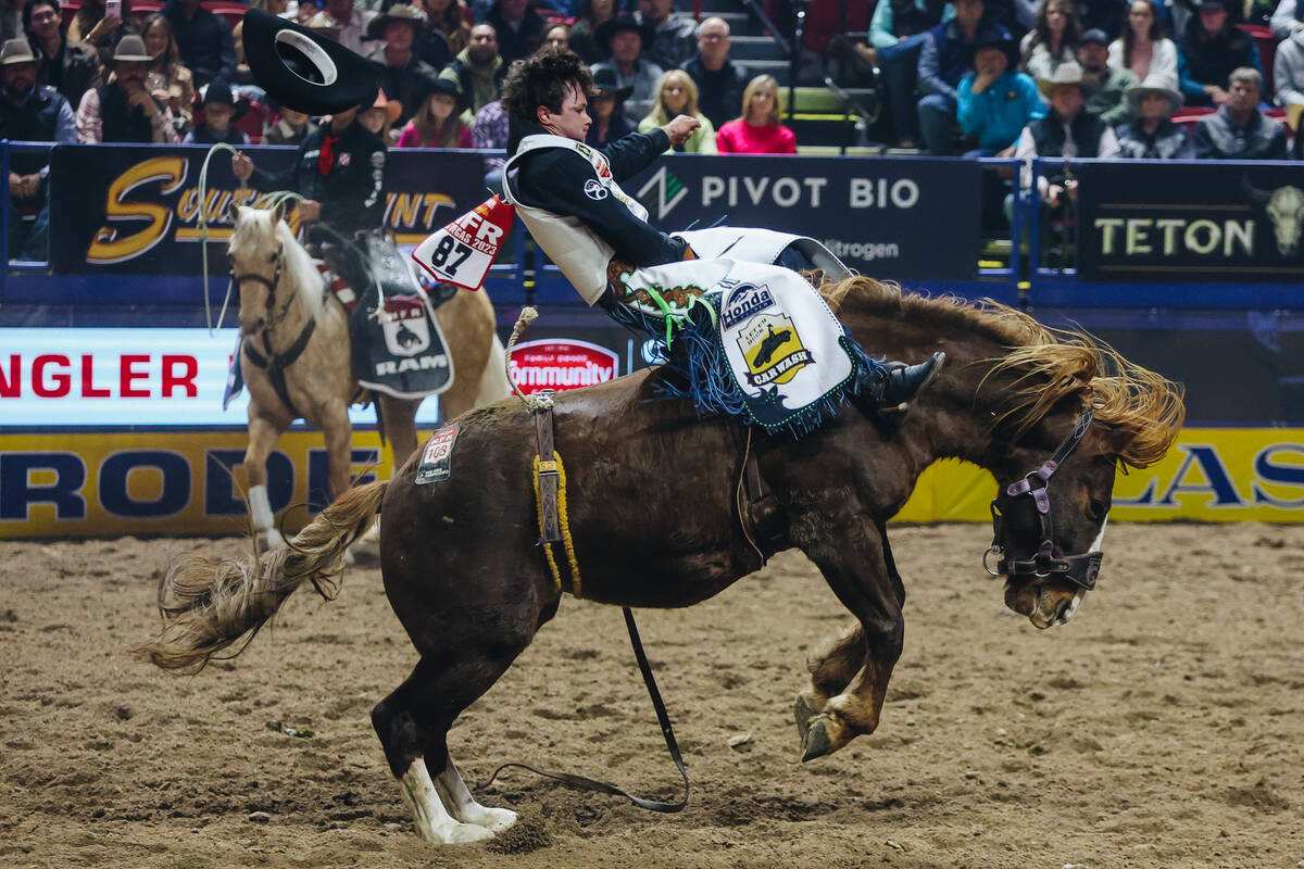 Cole Reiner rides She-La during round one of bare back riding at NFR in the Thomas & Mack C ...