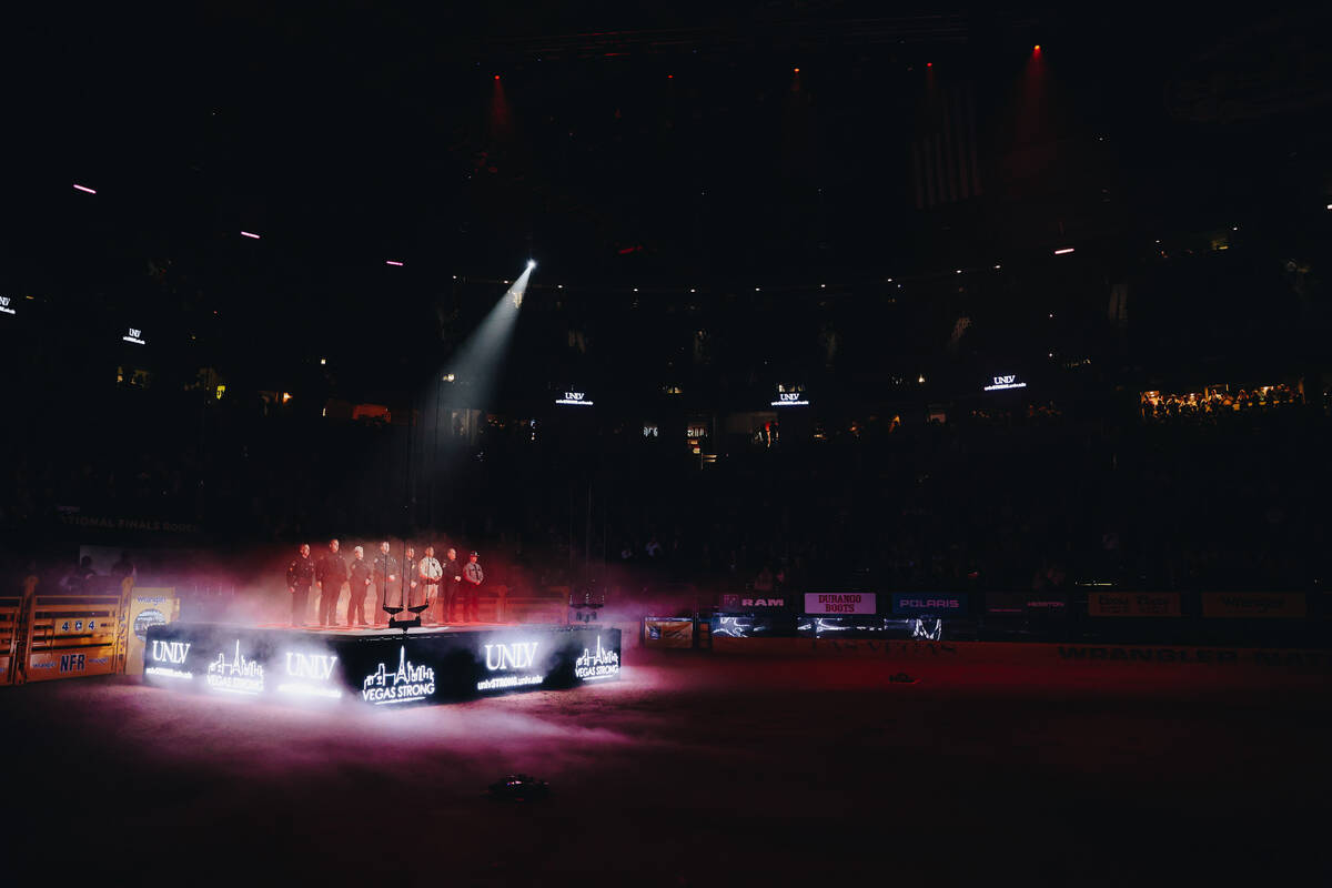 UNLV shooting first responders are honored during the opening ceremony of NFR at the Thomas &am ...