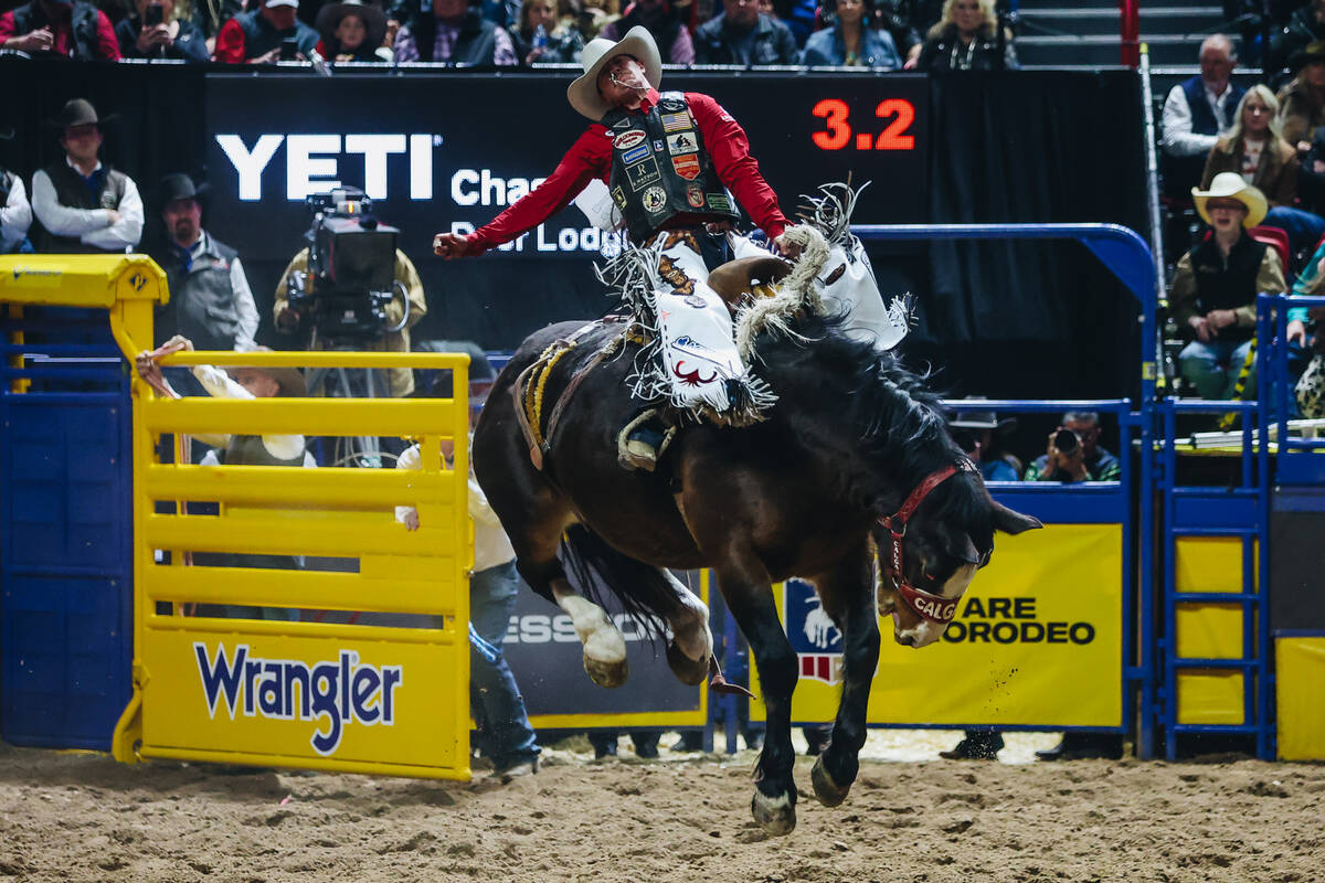 Chase Brooks bucks out of the chute on Get Down during the National Finals Rodeo at the Thomas ...