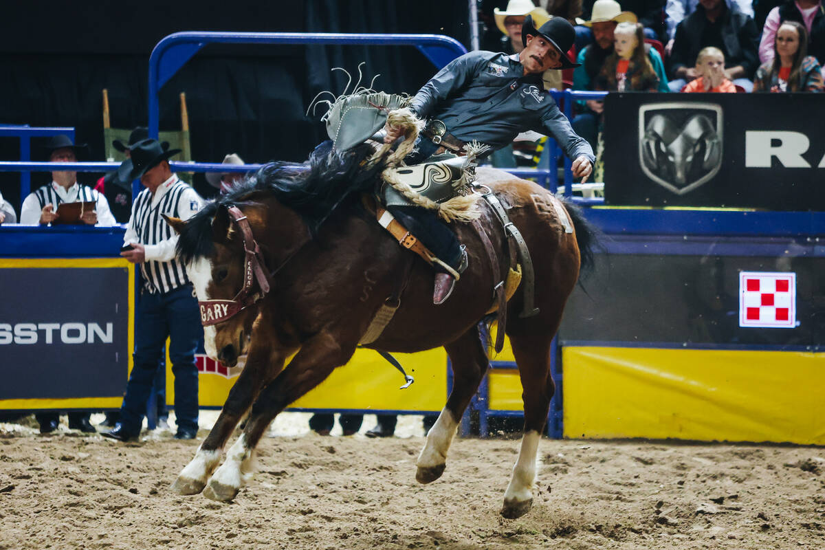 Tanner Butner rides Jitter Bug during the National Finals Rodeo at the Thomas & Mack Center ...