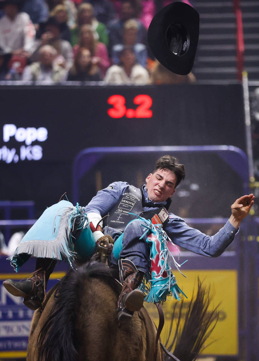 Reining world champion, Jess Pope, looks to make an eight second ride while he competes in bare ...