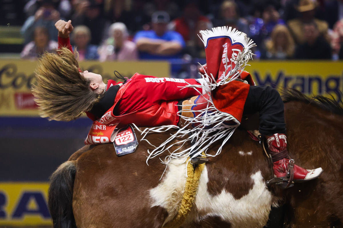 Rocker Steiner is bucked by his horse while he competes in bareback riding on day four of the N ...
