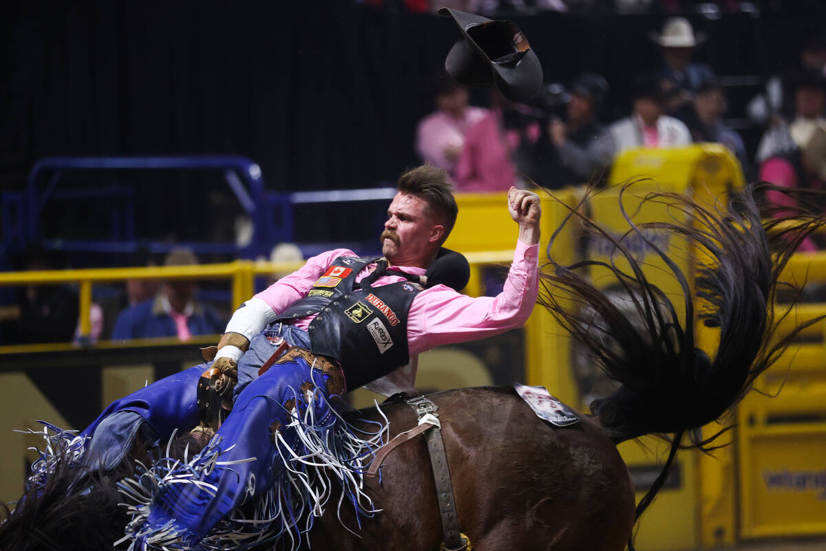 Orin Larsen’s hat flies off while competing in bareback riding on day four of the Nation ...