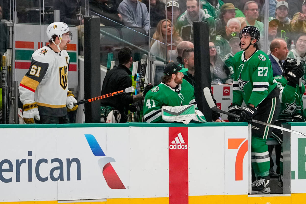 Vegas Golden Knights right wing Mark Stone (61) and Dallas Stars left wing Mason Marchment (27) ...