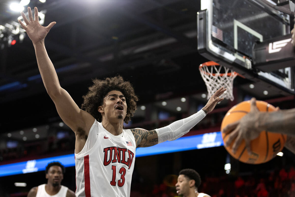 UNLV Rebels guard Brooklyn Hicks (13) defends against Loyola Marymount Lions during the first h ...