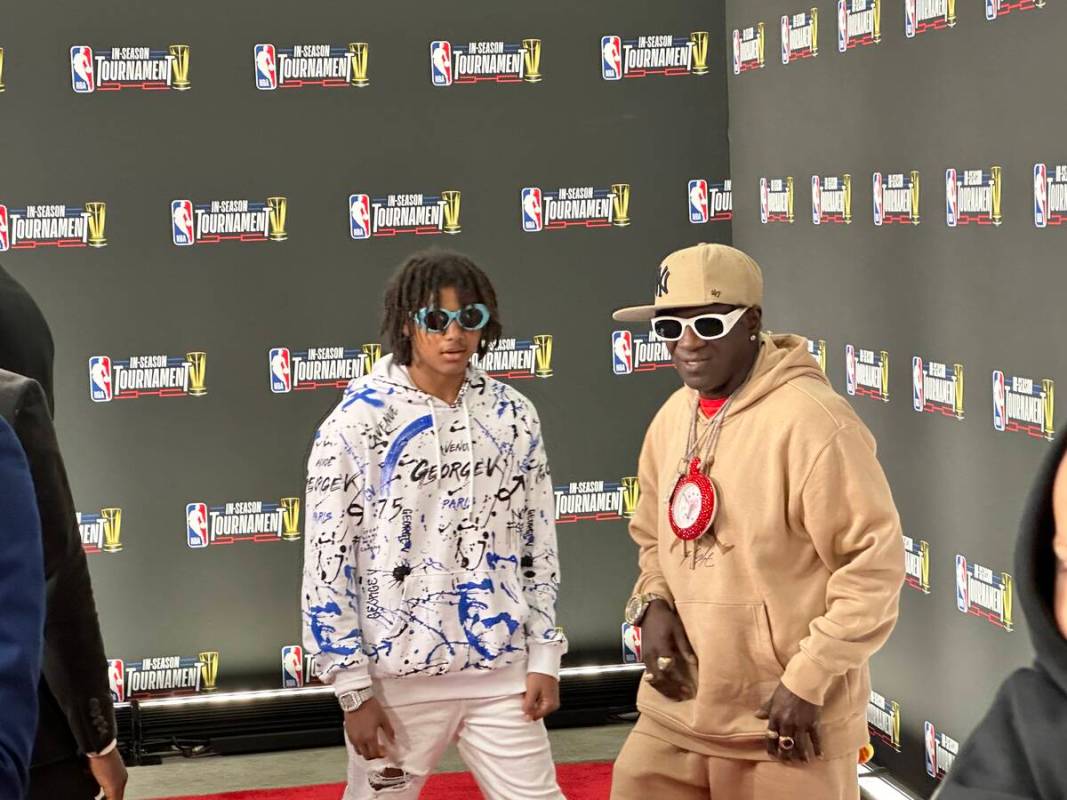 Flavor Flav and his son Karma are shown on the red carpet of the NBA In-Season In-Season Tourna ...