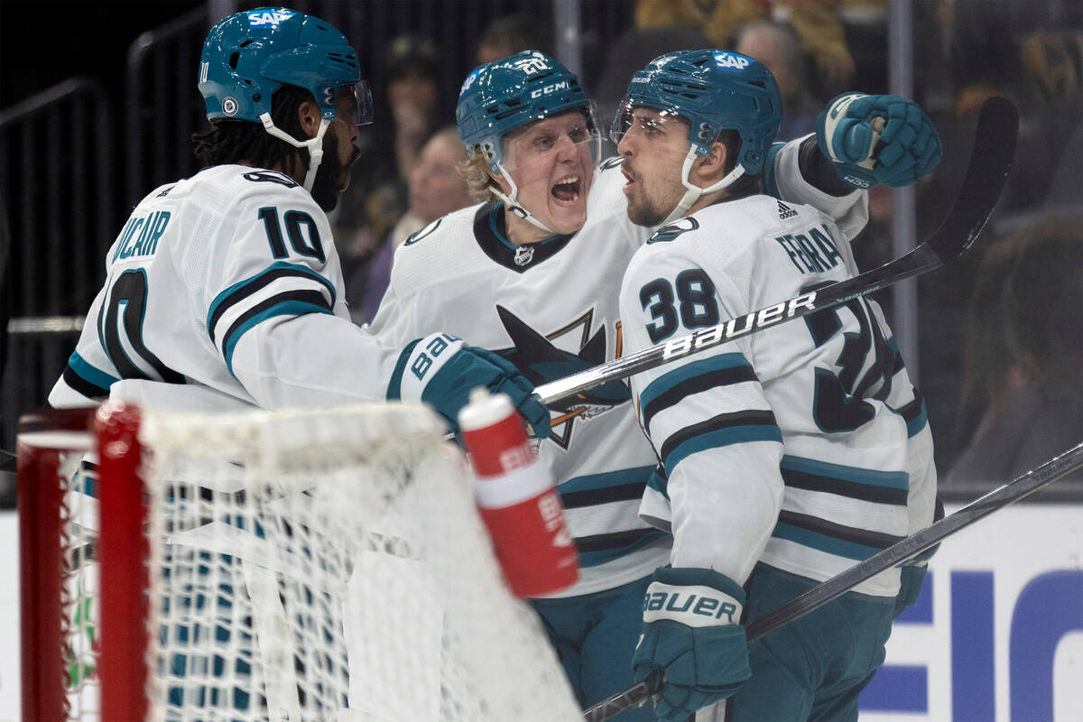 San Jose Sharks left wing Anthony Duclair (10), left wing Fabian Zetterlund (20) and defenseman ...